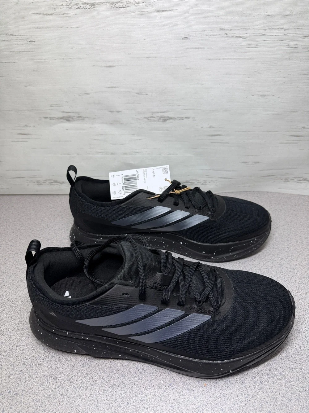 adidas Men's Black Athletic Shoes with Silver Stripes
